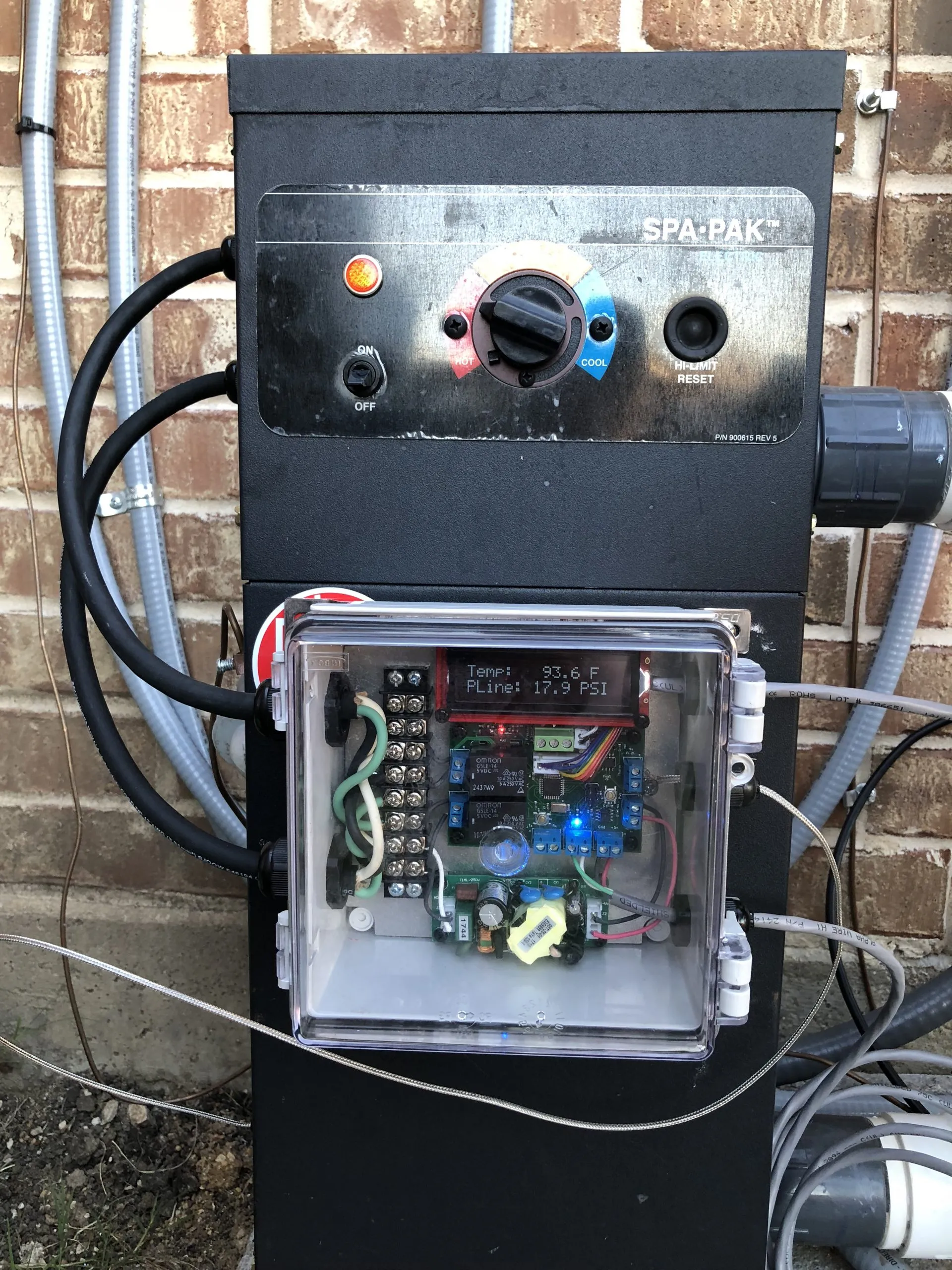 The hot tub controller installed.